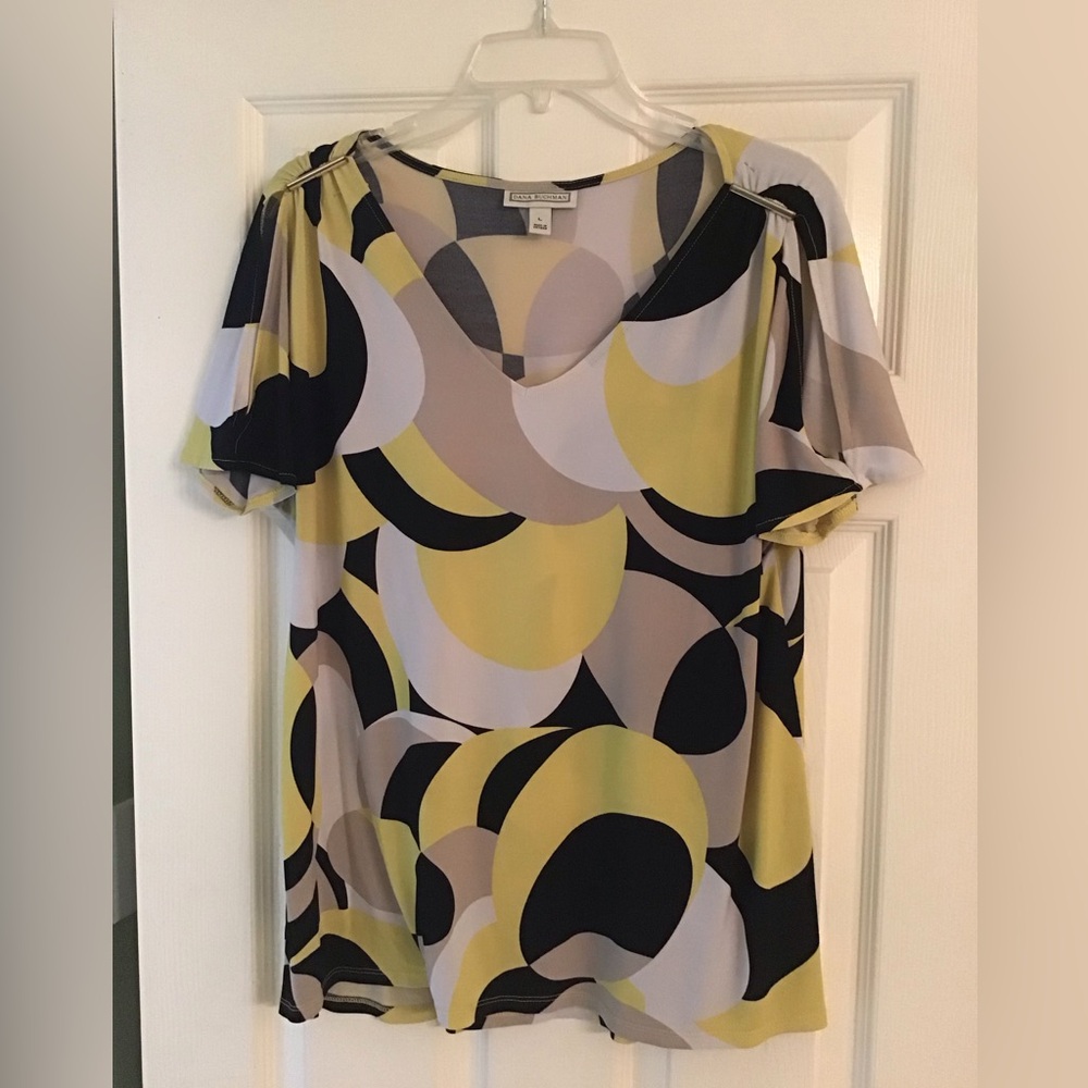 Yellow, white, tan and black blouse.
